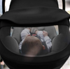 Vista superior de silla para bebés Clek liing con un bebé sentado